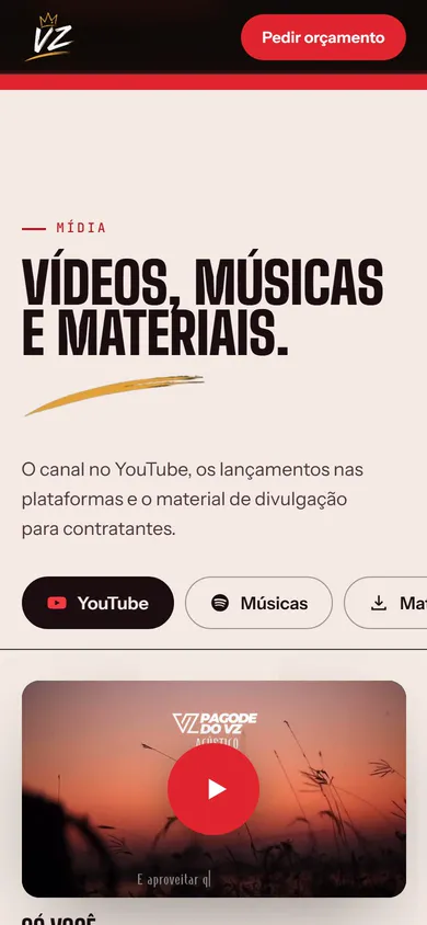 Site do VZ no celular: seção de mídia com as abas YouTube e Músicas e um vídeo do canal.